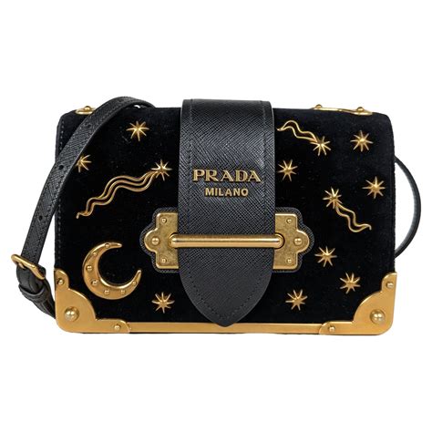 fake prada moon and stars bag|false Prada purse.